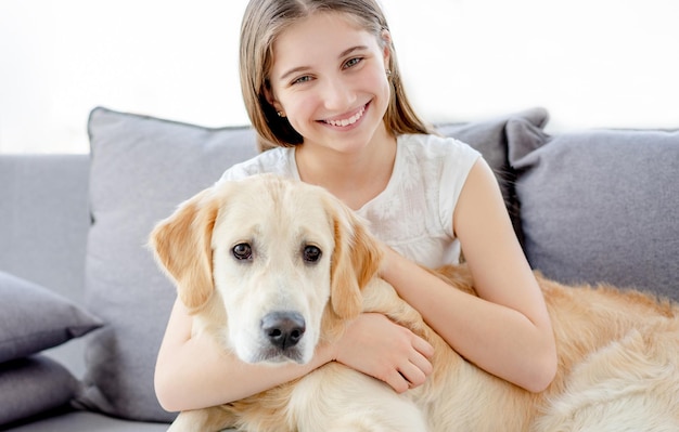 Smiling girl with adorable dog