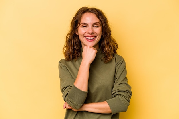 Smiling happy and confident touching chin with hand