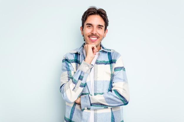 Smiling happy and confident touching chin with hand