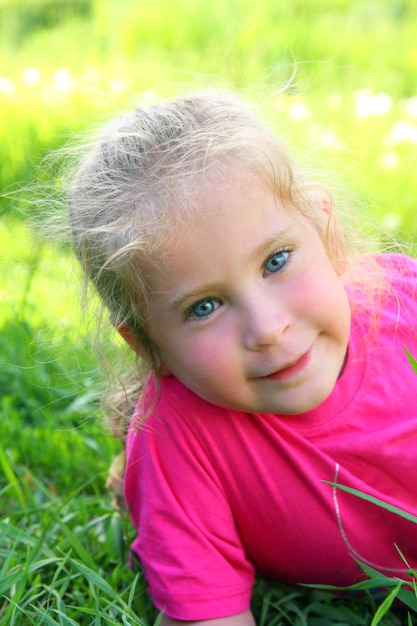 Smiling little girl outdoor portrait