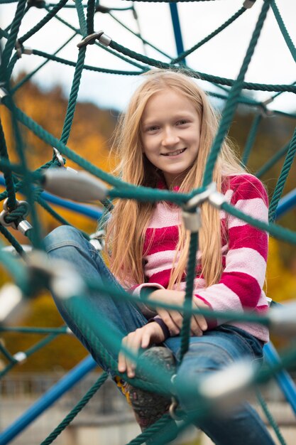 Smiling little girl at the playground