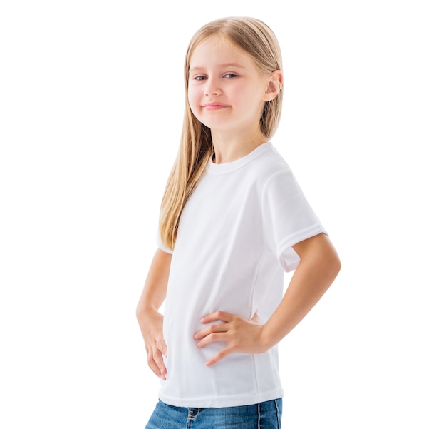 Smiling little girl in white blank t-shirt isolated on a white background