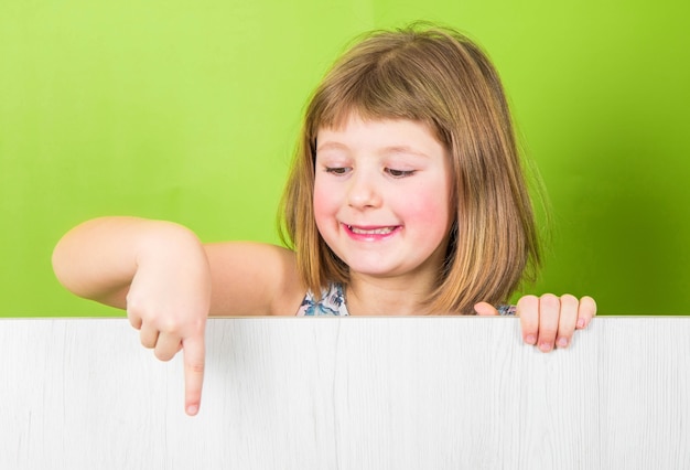 Smiling little girl with white panel