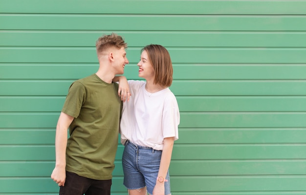 Smiling lovely couple standing