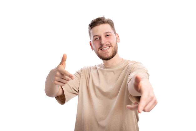 Smiling man pointing index fingers