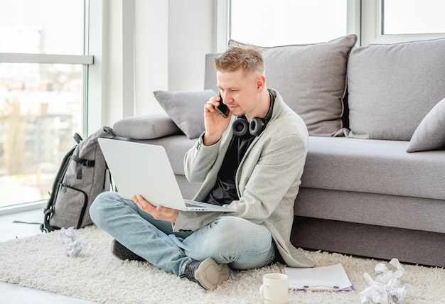 Smiling man working at home