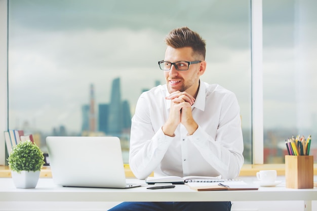 Smiling man at workplace