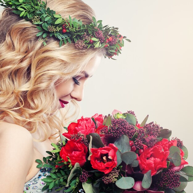 Smiling Model Holding Flowers Bouquet