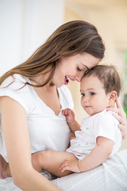 Smiling mother with baby 