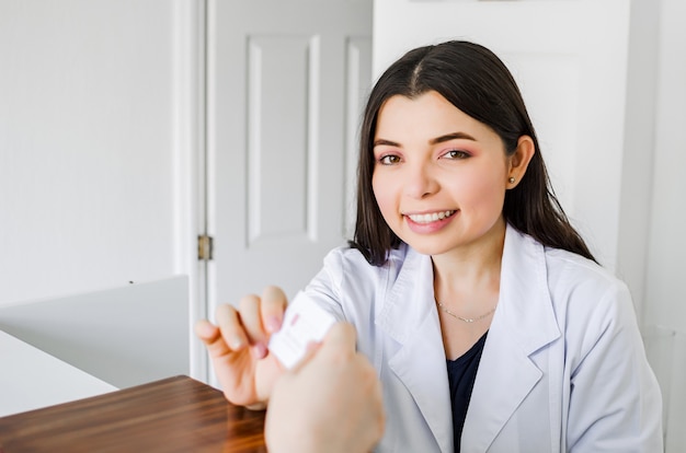 Smiling nutritionist in her office