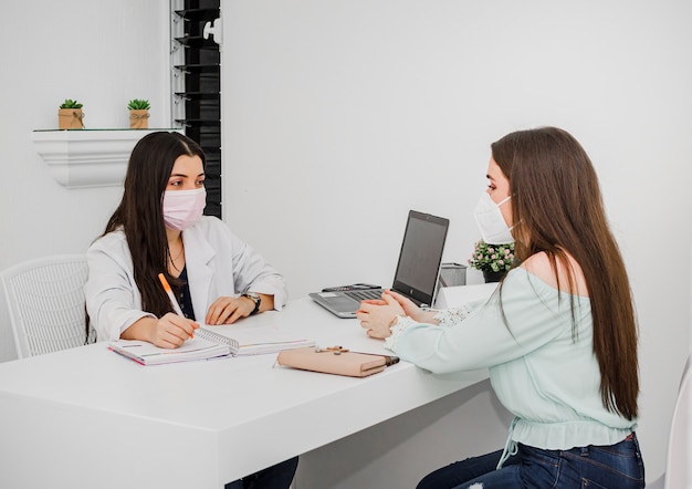 Smiling nutritionist in her office