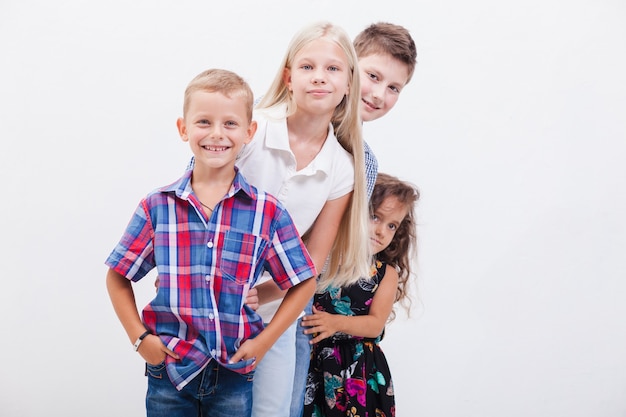 The smiling teenagers on white