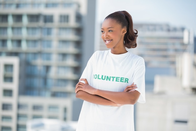 Smiling volunteer woman posing