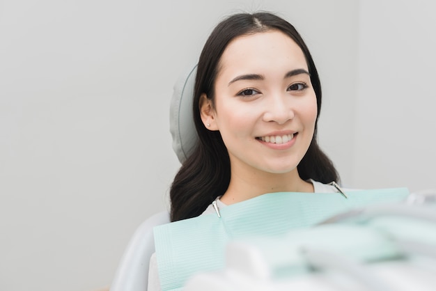 Smiling woman at dentist