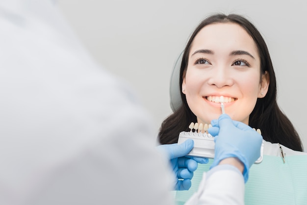 Smiling woman at dentist