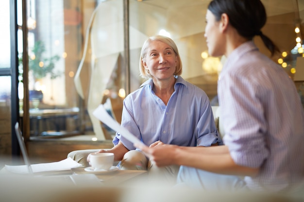 Smiling Woman Enjoying Business Meeting