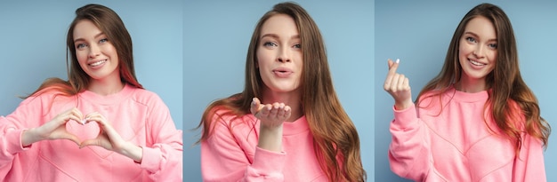 smiling woman gesturing heart with fingers air kiss looking at camera isolated on blue background