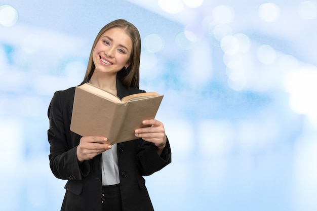 Smiling woman with books