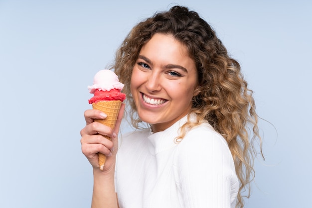 Smiling woman with an ice cream cone