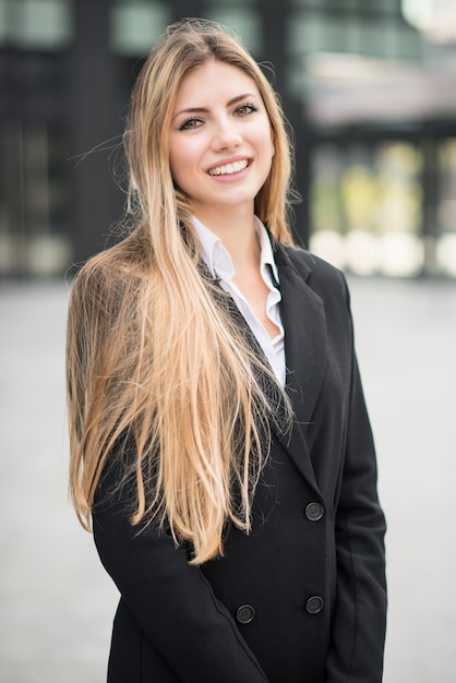 Smiling young business woman portrait