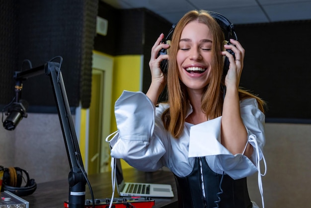 Smiling young girl listening to music