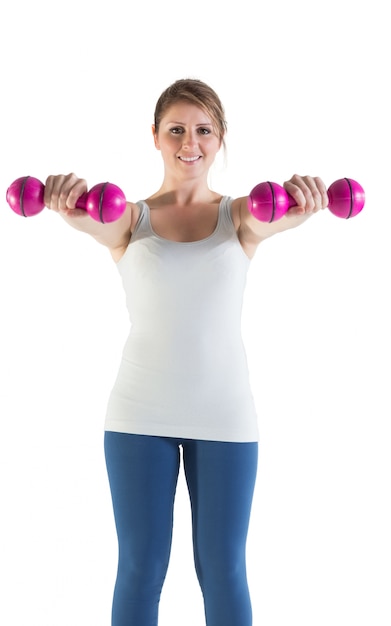 Photo smiling young woman with dumbbells