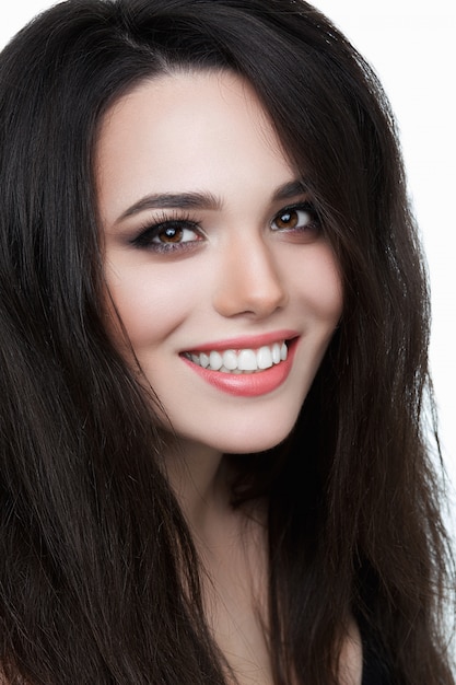 Smiling young woman with healthy teeth,brunette portrait of smiling widely