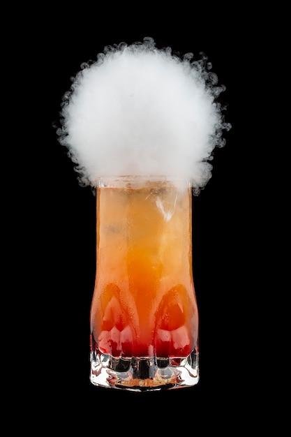 Smoke bubble orange cocktail on black background Bubble burst Isolated