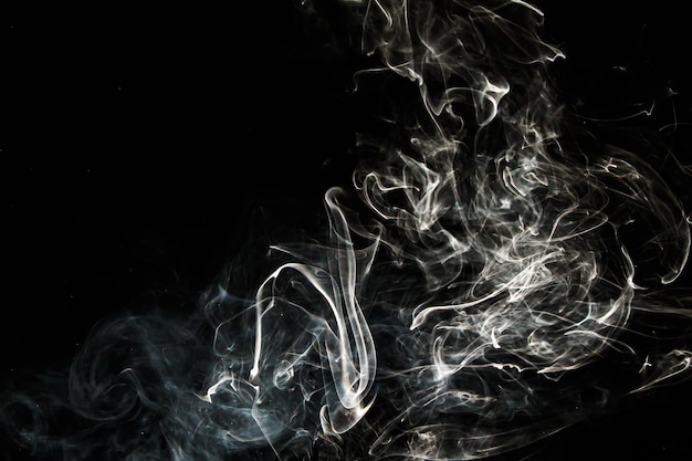 Smoke effect texture Isolated background Black and dark backdrop Smokey fire and mistic effect