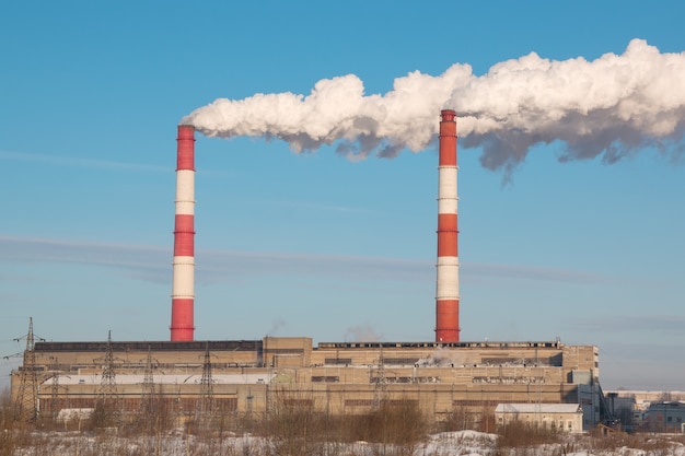 The smoke from the chimney of the industrial plant