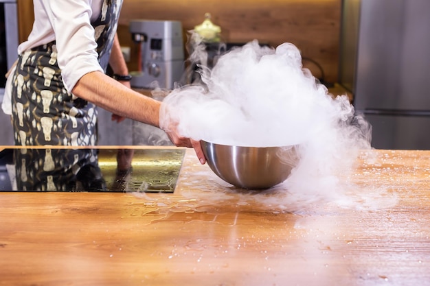 Smoke vapor dry ice in bowl in kitchen