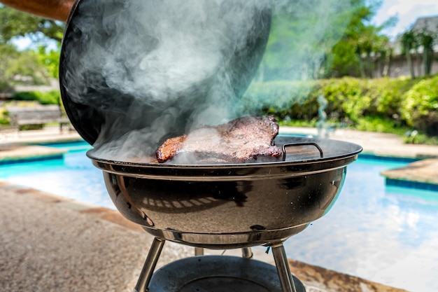 Photo smoked brisket on the bbq grill