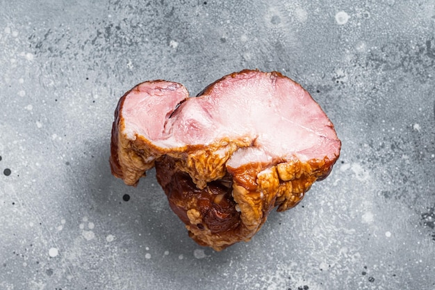 Smoked gammon pork shoulder meat Gray background Top view