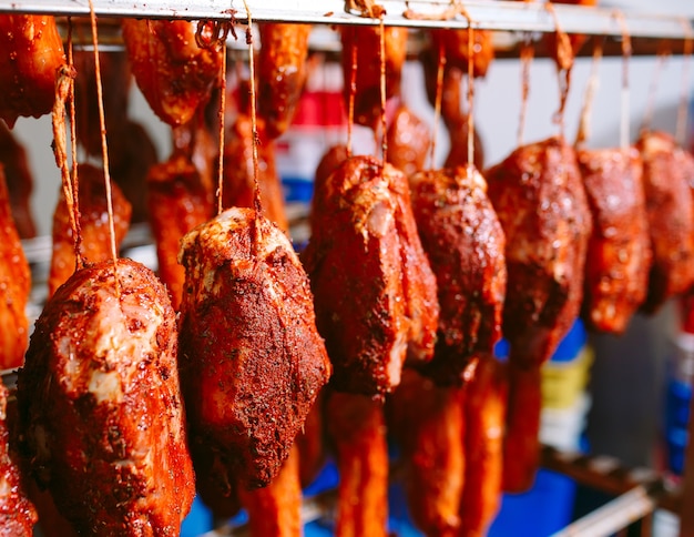 Smoked ham in the oven, Sausage production in the factory.