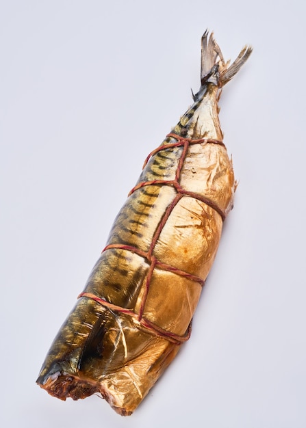 Smoked mackerel fish isolated on white background close up top view