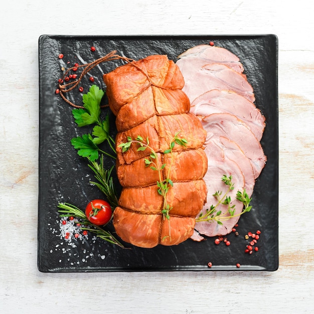 Smoked pork meat with spices and herbs Top view Free space for text