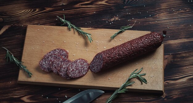 Smoked sausage on a wooden board