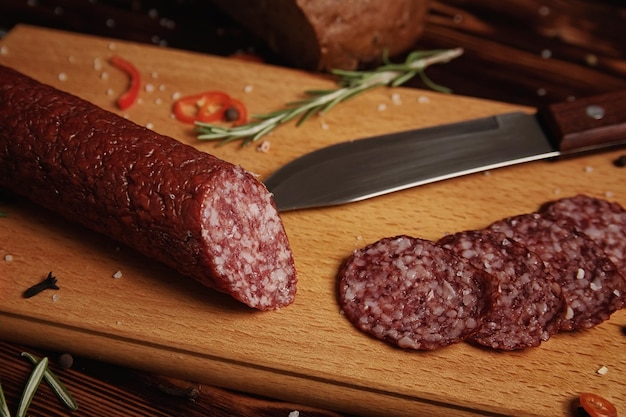 Smoked sausage on a wooden cutting board