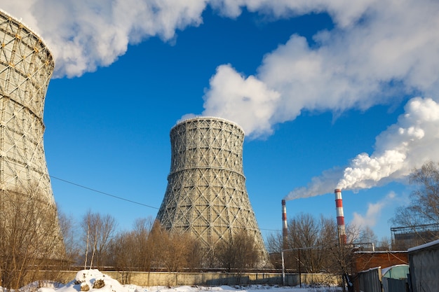 Smokestack tower thermal power station in winter