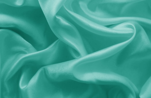 Smooth elegant blue silk or satin texture can use as background