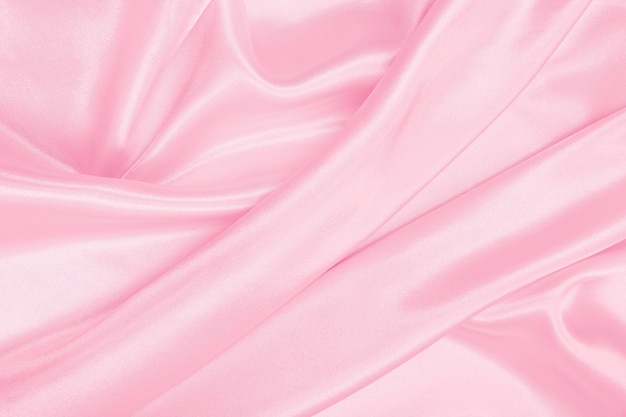 Smooth elegant pink silk or satin texture as wedding background