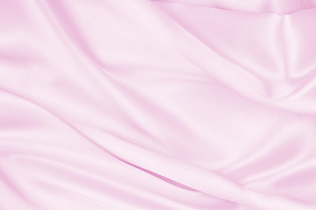 Smooth elegant pink silk or satin texture as wedding background