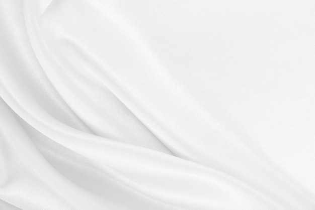 Smooth elegant white silk or satin luxury cloth texture as wedding background design