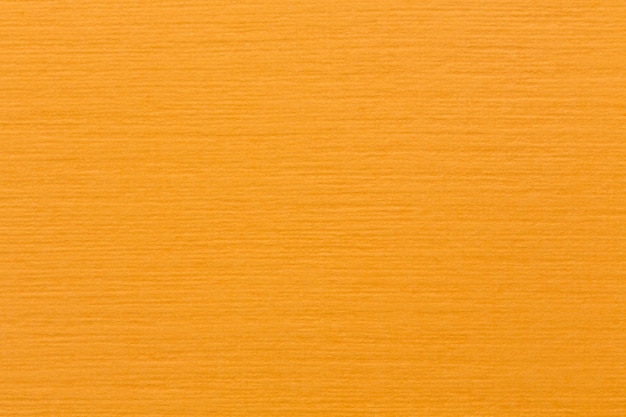 Smooth light orange felt fabric background texture top view