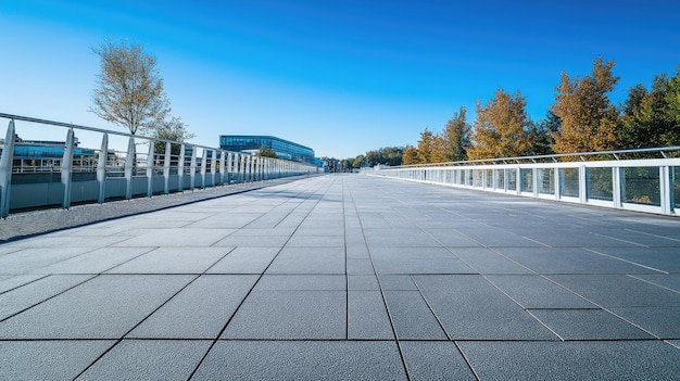 Photo smooth pavement on a modern pedestrian walkway with a clear blue sky overhead