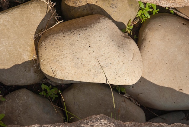 Smooth stones in summer day background