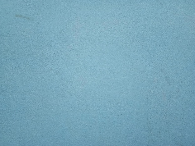 Smooth surface blue cement wall background