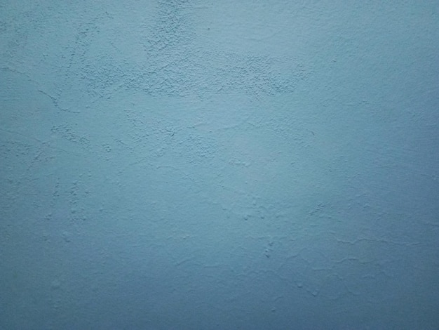 Smooth surface blue cement wall background