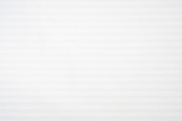 Smooth white bed sheet with horizontal lines as texture or background