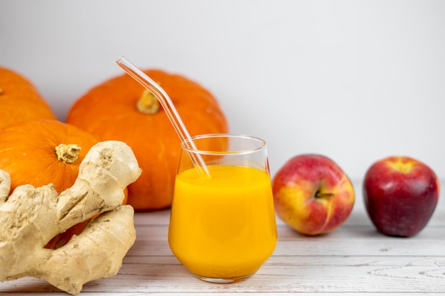 Smoothie or pumpkin juice with ginger and apples healthy eating